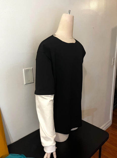 Black and white shirt on a mannequin. 
